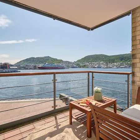 Sea-kissed Elegance: Your City Retreat Apartment